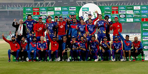 Karachi Kings officials and players pose with the winning trophy after the final of the PSL T20 cricket match against Lahore Qalandars at National Stadium in Karachi. (Photo | AP)
