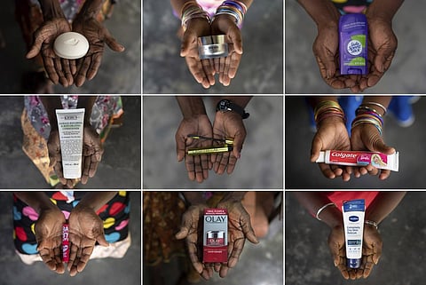 This combination photo shows the hands of five generations of women from a family that has worked on the same palm oil plantation since the early 1900s, ranging in age from 6 to 102. (AP)