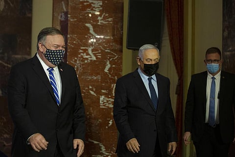 U.S. Secretary of State Mike Pompeo, left, and Israeli Prime Minister Benjamin Netanyahu leave after making a joint statement in Jerusalem. (Photo | AP)