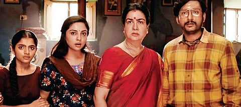 Smruthi Venkat (Second Left) in a still from 'Mookuthi Amman;.