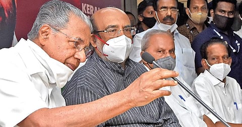 Chief Minister Pinarayi Vijayan at the function in which the newly elected director board members of the Kerala Bank assumed office in Thiruvananthapuram on Friday. Finance Minister Thomas Isaac, Kera