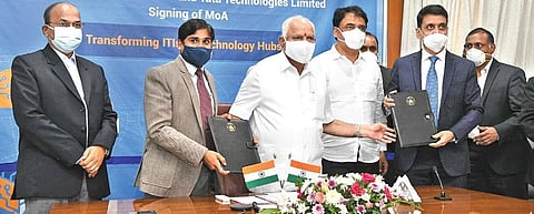 Chief Minister B S Yediyurappa at the signing of an MoU between the state government and Tata Technologies Ltd on Friday