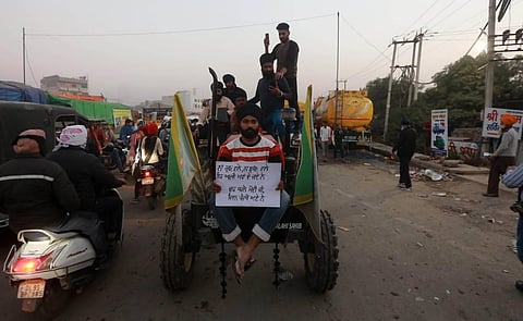 Farmers during their ongoing protest march against new farm laws in New Delhi on Wednesday. (Photo | Shekhar Yadav/EPS)