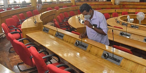 An official checking the microphone in the council hall in Thiruvananthapuram City Corporation on the eve of the swearing-in ceremony. (Photo| BP Deepu, EPS)