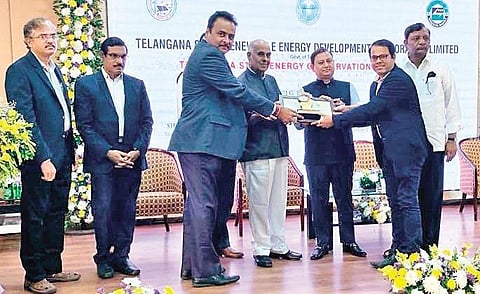 GMR-led Hyderabad International Airport Ltd officials receive the gold award at the Telangana State Energy Conservation Awards 2020