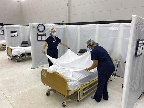In hard-hit Los Angeles County, Nerissa Black, a nurse at Henry Mayo Newhall Hospital, estimated she's been averaging less than 10 minutes of care per patient every hour. (Photo | AP)