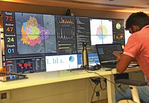 A BBMP staffer monitors cases at the Covid war room on Thursday | Nagaraja Gadekal