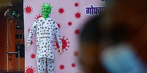 An effigy of the year 2020 depicting 'coronasur' at Worli in Mumbai Sunday. (Photo | PTI)