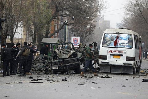 Afghan security personnel inspect the site of a bomb attack in Kabul, Afghanistan. (fILE Photo | AP)