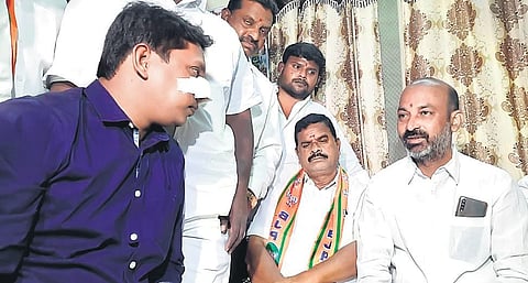BJP Telangana president Bandi Sanjay Kumar called on Praveen, who was injured in disturbances during the GHMC polls at Chaitanyapuri, Hyderabad on Tuesday
