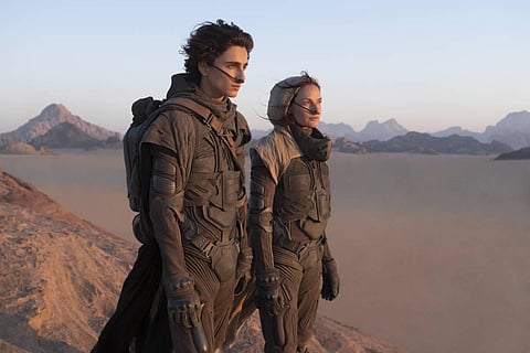 This image released by Warner Bros. Entertainment shows Timothee Chalamet, left, and Rebecca Ferguson in a scene from the upcoming 2021 film 'Dune.' (Photo | AP)