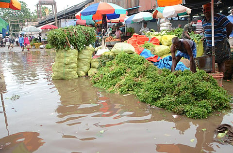 Due to heavy rain, water entered vegetable market in Thoothukudi. (Photo | EPS/ V.KARTHIKALAGU)