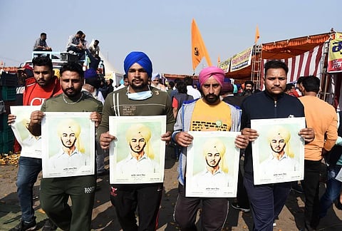 Farmers at Singhu border during their ongoing protest against the Centres farm reform laws in New Delhi Tuesday Dec. 8 2020. (Photo | Parveen Negi/EPS)
