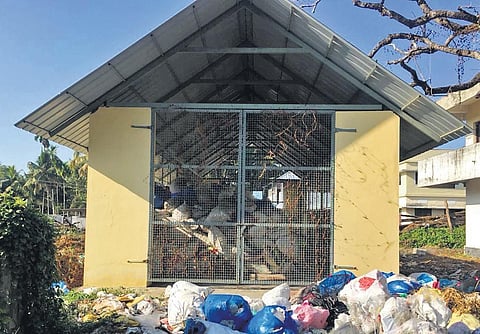 The overloaded Material Collection Facility (MCF) center of Njarakkal panchayat. (Photo| EPS)