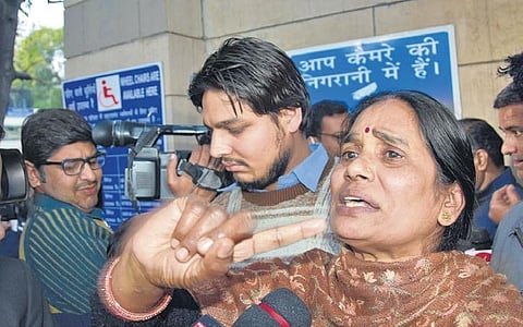 Nirbhaya’s mother reacts outside a city court on Friday after the execution of death warrants was postponed till further order. The four men convicted in the gruesome gangrape and murder case were to be hanged on February 1 | PTI
