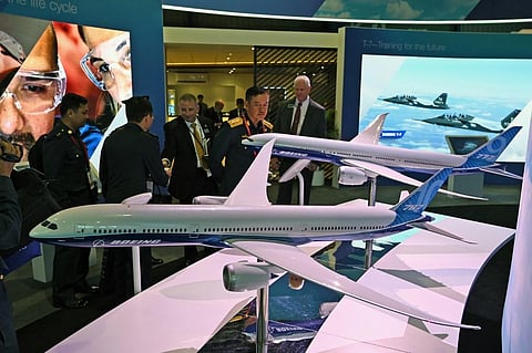 Boeing 777 and 787 airplane models are exhibited at the Singapore Airshow in Singapore on February 11, 2020. (Photo | AFP)