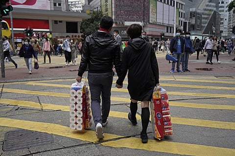 China on Friday reported another sharp rise in the number of people infected with a new virus, as the death toll neared 1,400. (Photo | AFP)