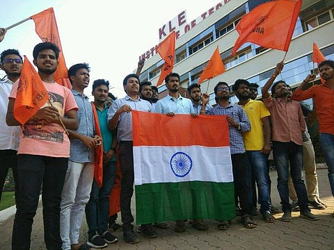 ABVP members staging protests at the premises of KLE Institute of Technology in Hubballi on Saturday. (Photo | EPS/D Hemanth)