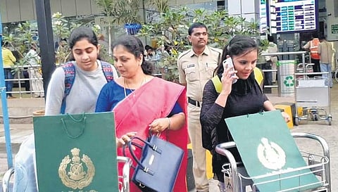 Two girls who returned from China, after 14-day mandatory quarantine in New Delhi, at the Vizag airport on Tuesday I Express