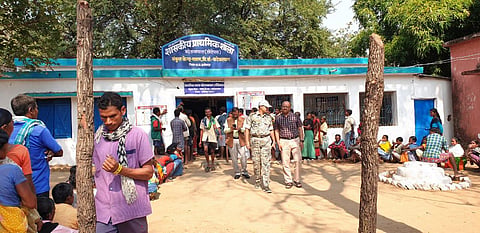 Surrendered Maoists awaiting their turn in a queue to exercise their right to vote in panchayat polls (Photo | EPS)