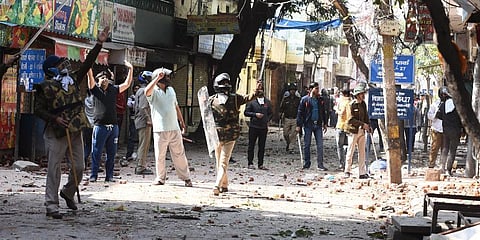 Police take charge as pro and anti CAA protesters clash at Jafrabad in north-east Delhi on Monday. (Photo | Parveen Negi, EPS)