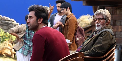 Amitabh Bachchan sitting with his fellow actor Ranbir Kapoor during the shoot of their upcoming sci-fi flick 'Brahmastra'. (Photo | Twitter)
