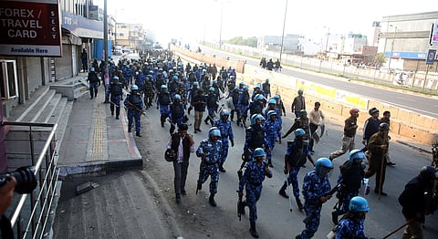 Security personnel conduct flag march during clashes between those against and supporting the Citizenship Amendment Act in north east Delhi Tuesday Feb. 25 2020. (Photo | Shekhar Yadav/EPS)