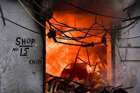 A shop set ablaze by miscreants following clashes over the new citizenship law, in Gokulpuri area of northeast Delhi. (Photo | PTI)