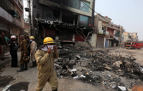 Burnt-out and damaged shops following clashes between people supporting and opposing a contentious amendment to citizenship law in New Delhi on Wednesday. (Photo | Shekhar Yadav/EPS)