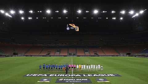 Inter Milan, left, and Ludogorets line-up inside the empty San Siro stadium in Milan, Italy ahead of their Europa League round of 32 second leg soccer match Thursday Feb. 27, 2020. (Photo | AP)
