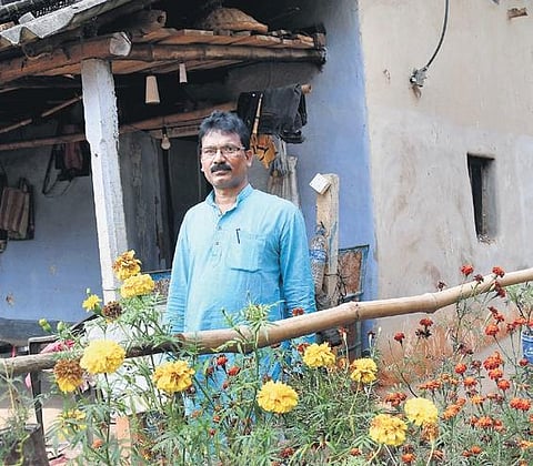 (From left) Tribal leader Chhatradhar Mahato at his Lalgarh residence. (Photo | EPS)