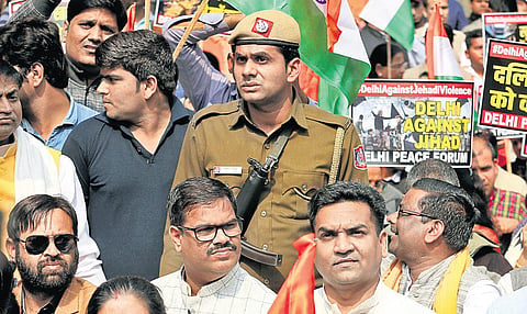 BJP leader Kapil Mishra participates in a peace march to protest against communal violence in Northeast Delhi