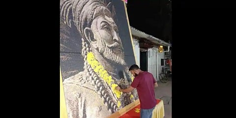 Nitin Dinesh Kamble created the 10X8 feet portrait in 10 days using 46,080 plastic bits of six different colours. (Photo | ANI)