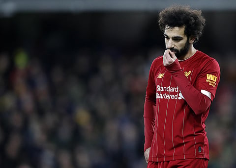 Following a meeting of shareholders today, it was unanimously decided to suspend the Premier League. (AP Photo/Alastair Grant)
