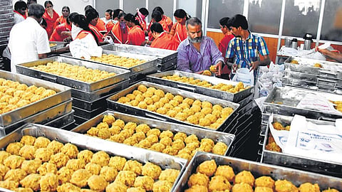 Laddus being packed for free distribution among TTD employees at Administrative Building in Tirupati on Saturday.