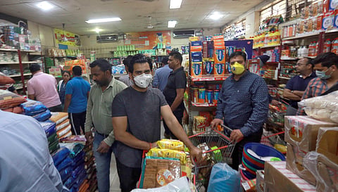 People flock to departmnental stores to stock up on groceries. (Photo | Shekhar Yadav, EPS)