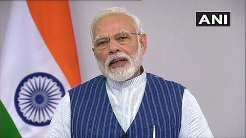 PM Narendra Modi interacting with citizens of Varanasi via videoconferencing. (Photo | Twitter/ANI)
