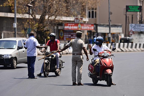 Police personnel checking motorists during lockdown.(Photo | Debadatta Mallick, EPS)