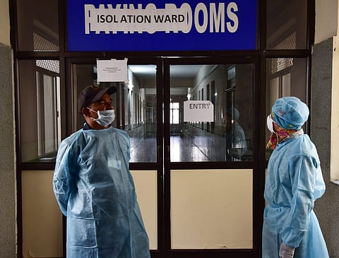 Private security wearing fully protective clothes at an Isolation ward specially for coronavirus patinents at Gandhi Hospital on Monday as one suspect patient who arrived from Dubai was admitted on Monday. (Photo | Vinay Madapu/EPS)