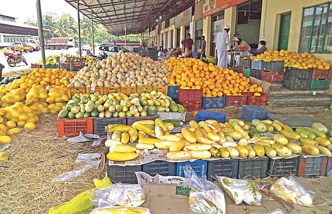 Fruits piled up at the wholesale fruits and vegetable market at Nettoor. Last week, the market had disposed of a truckload of produce A Sanesh