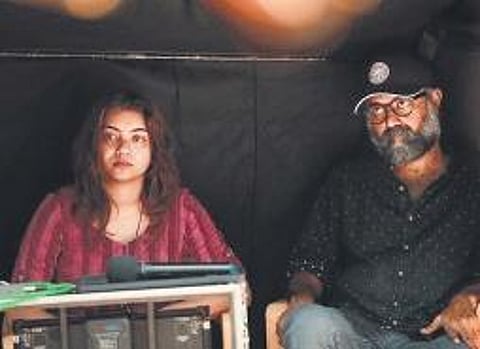 Kavya Prakash with Unni R on the set of Vaanku