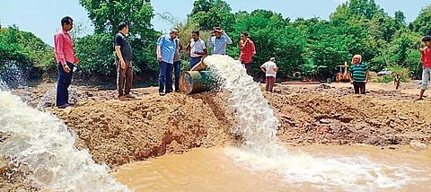 Pumpsets being placed in Panchanabettu to supply water from craters in the river to the reservoir in Shiroor, Udupi | EXPRESS