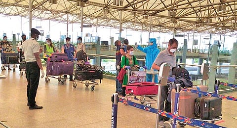US-bound passengers arrive at the Rajiv Gandhi International Airport on Sunday to board their special flights