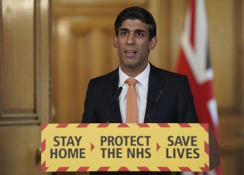 In this handout photo provided by 10 Downing Street, Britain's Chancellor Rishi Sunak speaks during a media briefing on the coronavirus outbreak in Downing Street, London, Wednesday, April 8, 2020. (Photo | AP)