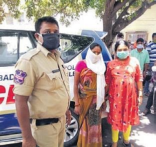 Police shift a pregnant woman to the hospital after she dialled 100 in Hyderabad on Wednesday