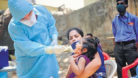 A doctor conducts a swab test (Photo | PTI)