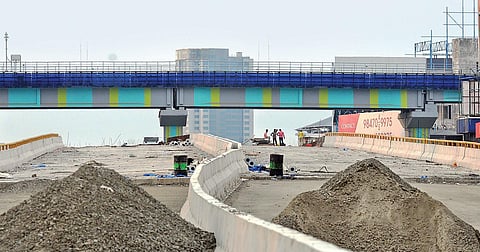 Amid lockdown restrictions, labourers at work on the Vyttila flyover. The much-extended project is expected to be completed by June | A Sanesh