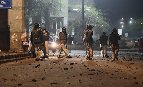 Policemen patrol outside the Jamia Milia University after the violence at the univerity following a protest against new Citizenship law, in New Delhi. (File Photo | Parveen Negi, EPS)
