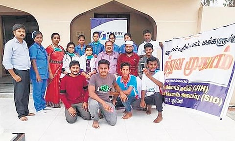 A file photo of Dr Simon with his team and members of Students Islamic Organisation during a medical camp at Nagapattinam in 2018