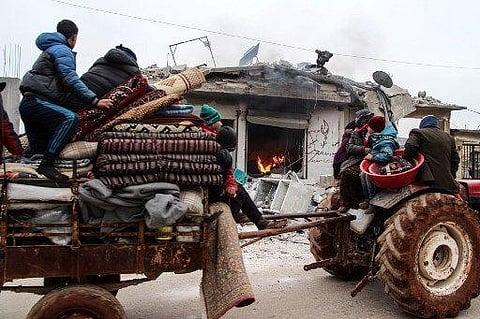 Members of a Syrian family fleeing attacks by pro-regime force. (File Photo | AFP)